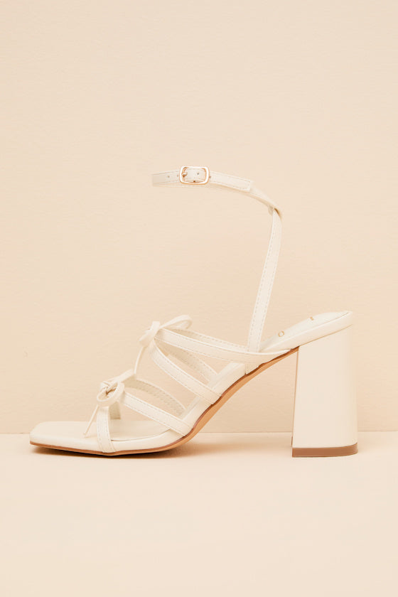 Jennie Gold Strappy Bow High Heel Sandals