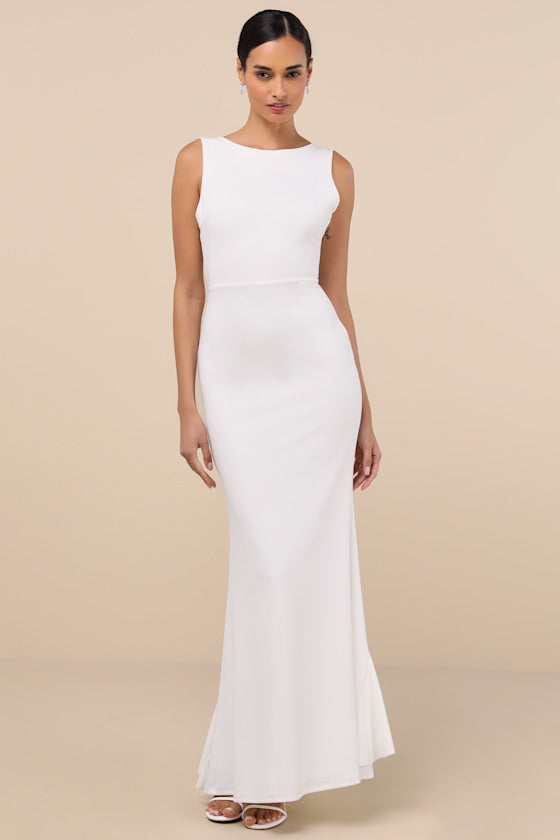 Exquisite Refinement Ivory Backless Bow Ruffled Maxi Dress #Color_Ivory